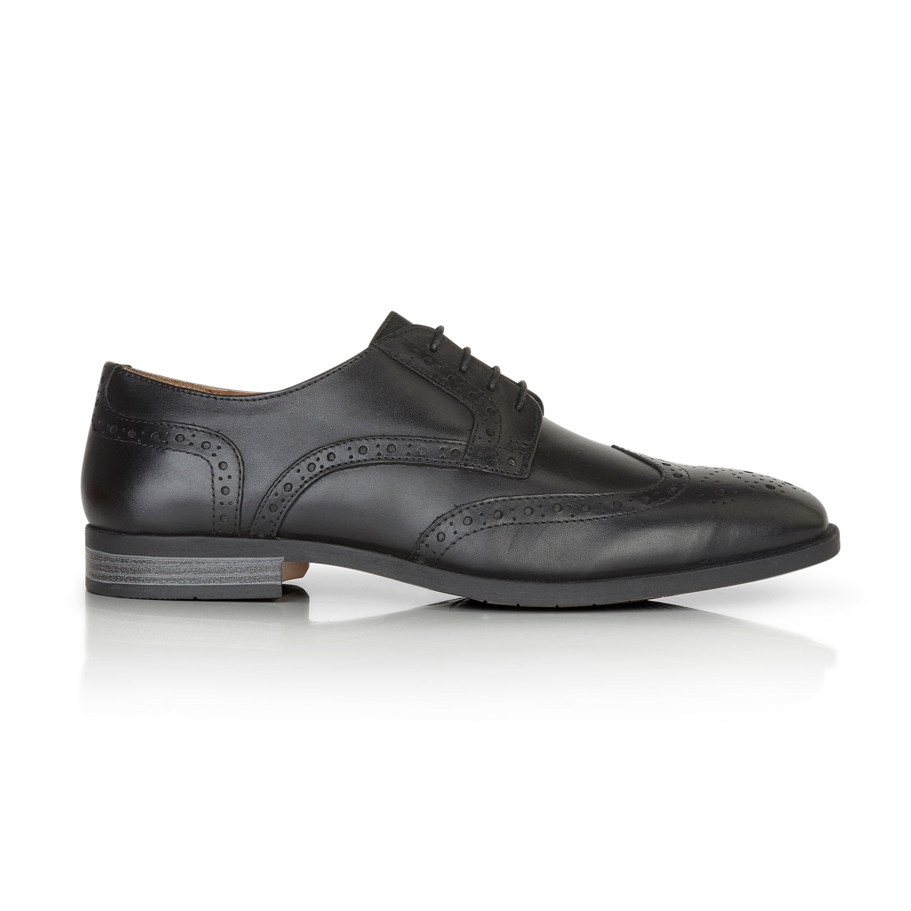 Side profile of Flint tan leather derby shoes in black with brogue detailing and lace-up closure
